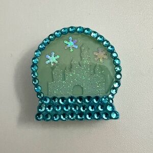 The Fawn Doe blue winter Disneyland snow globe straw charm